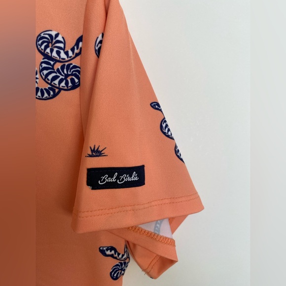 Bad Birdie Sidewinder Snake Performance Polo Short Sleeve Shirt Peach - Picture 8 of 10
